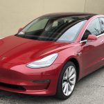 Tesla_Model_3_parked_front_driver_side